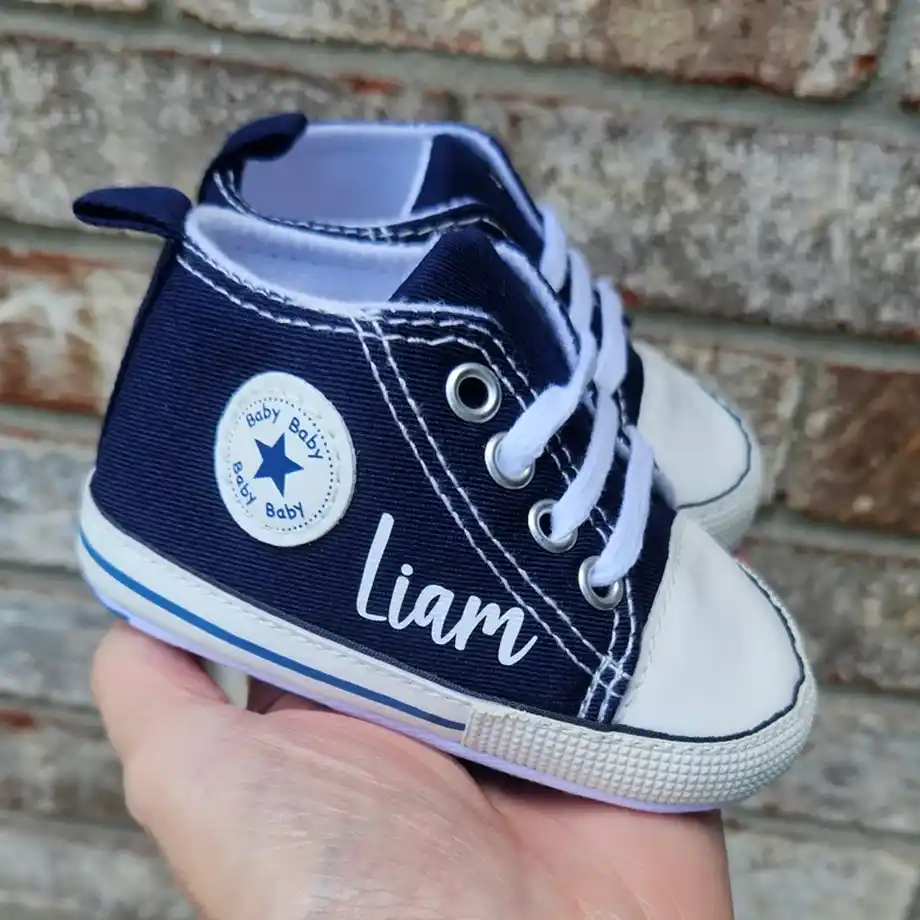 Celebrate your pregnancy with these adorable custom baby shoes. Personalized baby high tops make for a unique and memorable way to share your exciting news, perfect for those looking for creative pregnancy announcement ideas.