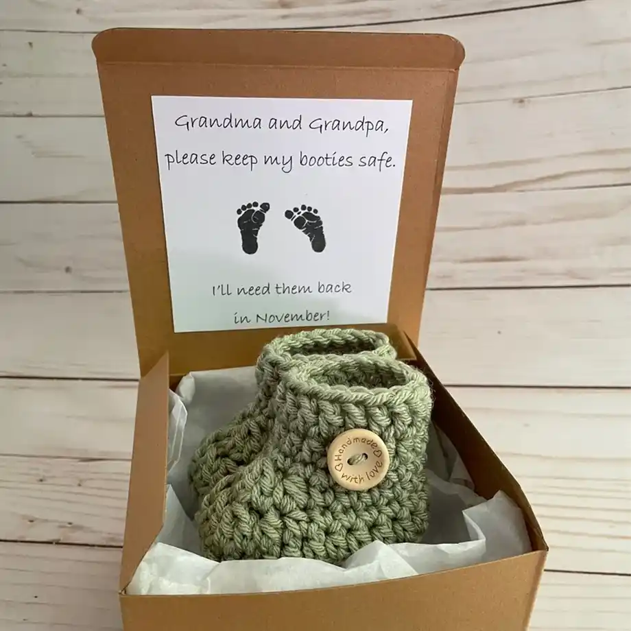 These adorable baby booties are a perfect way to announce your pregnancy to family and friends. A unique and heartfelt addition to your pregnancy announcement ideas.