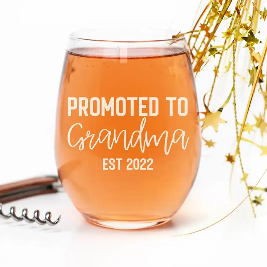 Celebrate the big news with this 'Promoted to Grandma' shirt, a fun and meaningful way to share your pregnancy announcement ideas!