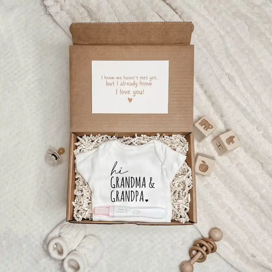 Surprise Grandma with this personalized 'Hi Grandma' pregnancy announcement box – a perfect and creative way to share your pregnancy announcement ideas!