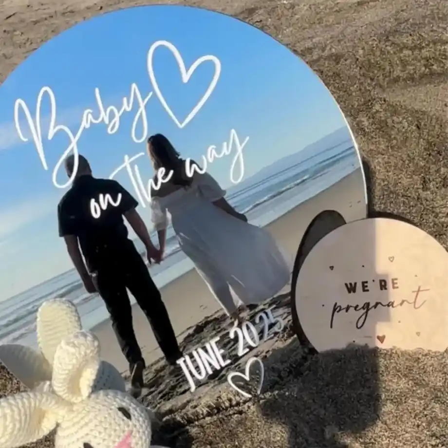 A stylish mirror pregnancy announcement sign featuring a custom due date design, ideal for elegant and creative pregnancy announcement ideas to surprise family and friends.