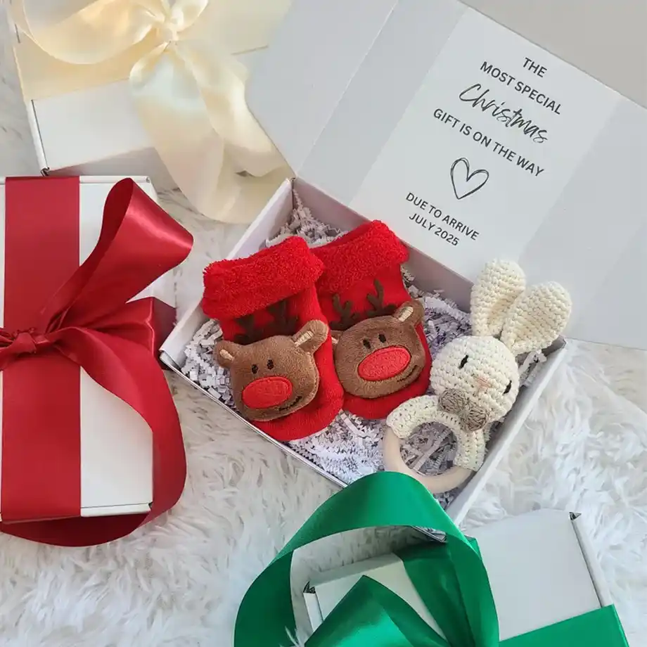 Beautiful 'First Grandchild' Christmas ornament, perfect for unique pregnancy announcement ideas. A memorable way to share your exciting news with grandparents during the holidays.