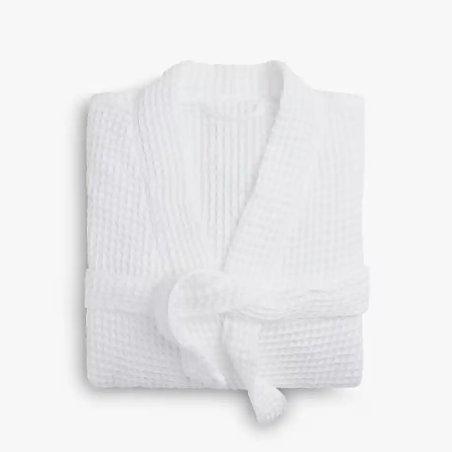 Soft and luxurious waffle robe in white, an ideal push present to pamper a new mom. This comfortable robe offers a touch of relaxation and warmth, making it the perfect gift to celebrate motherhood.