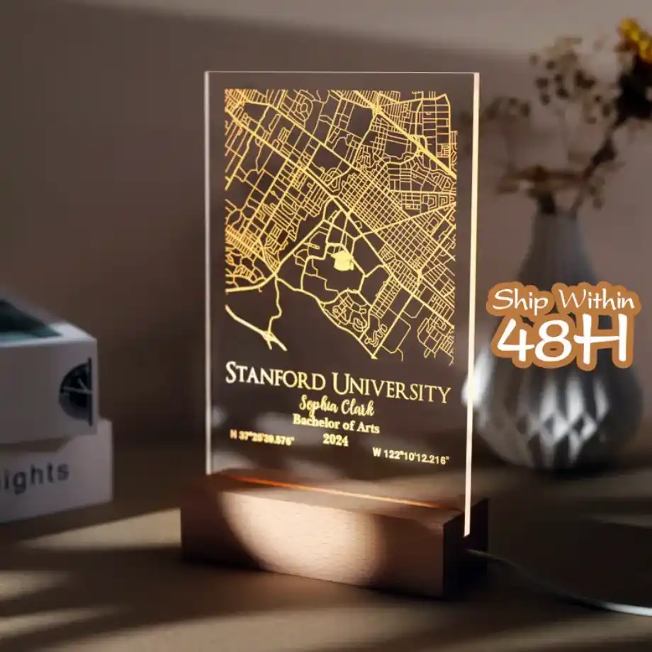 An elegant LED light featuring a detailed campus map of Stanford University with personalized text, including the graduate's name, 'Sophia Clark,' degree, 'Bachelor of Arts,' and graduation year, '2024.' The design is illuminated on a wooden base, making it a unique and memorable gift.