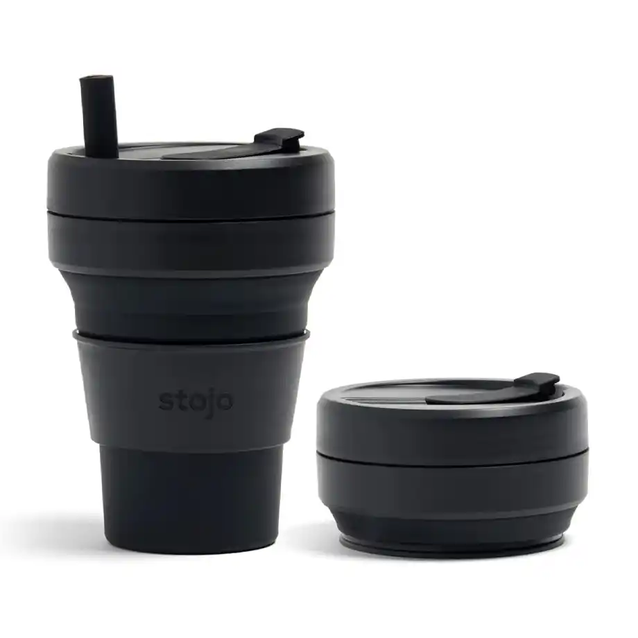 A sleek black collapsible Stojo cup, perfect for sharing birthday wishes for a coworker who loves eco-friendly and practical gifts.