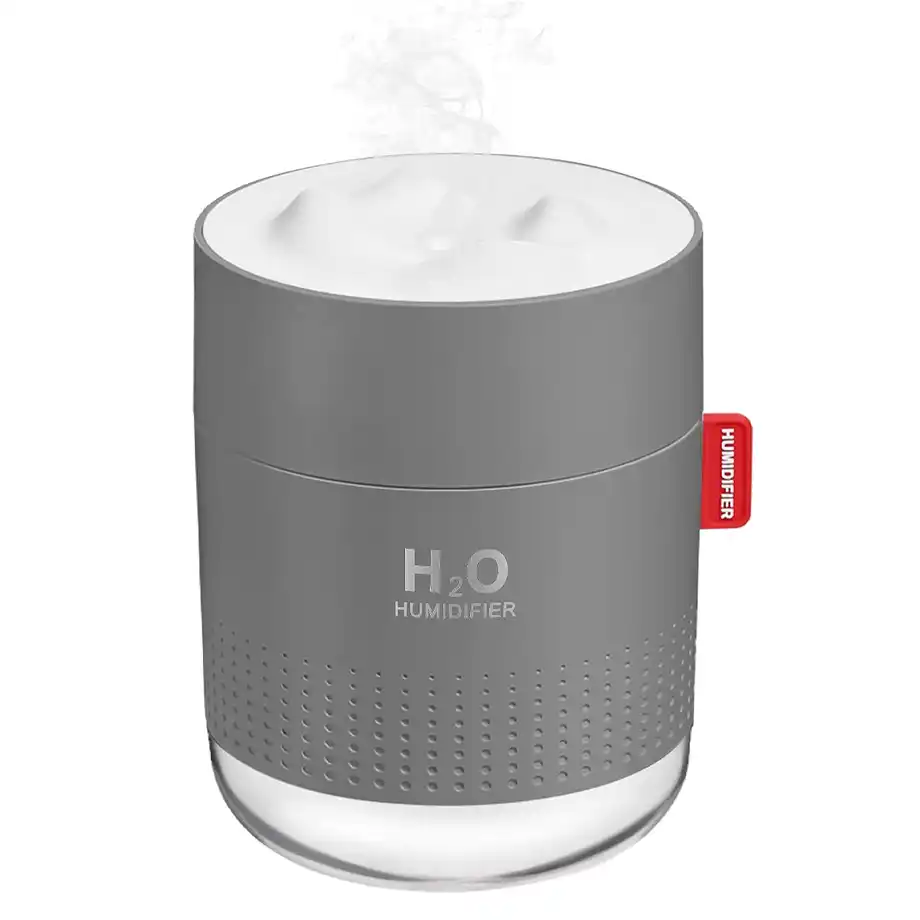 Portable small cool mist humidifier in sleek design, perfect as a desk accessory or thoughtful gift to accompany birthday wishes for a coworker.