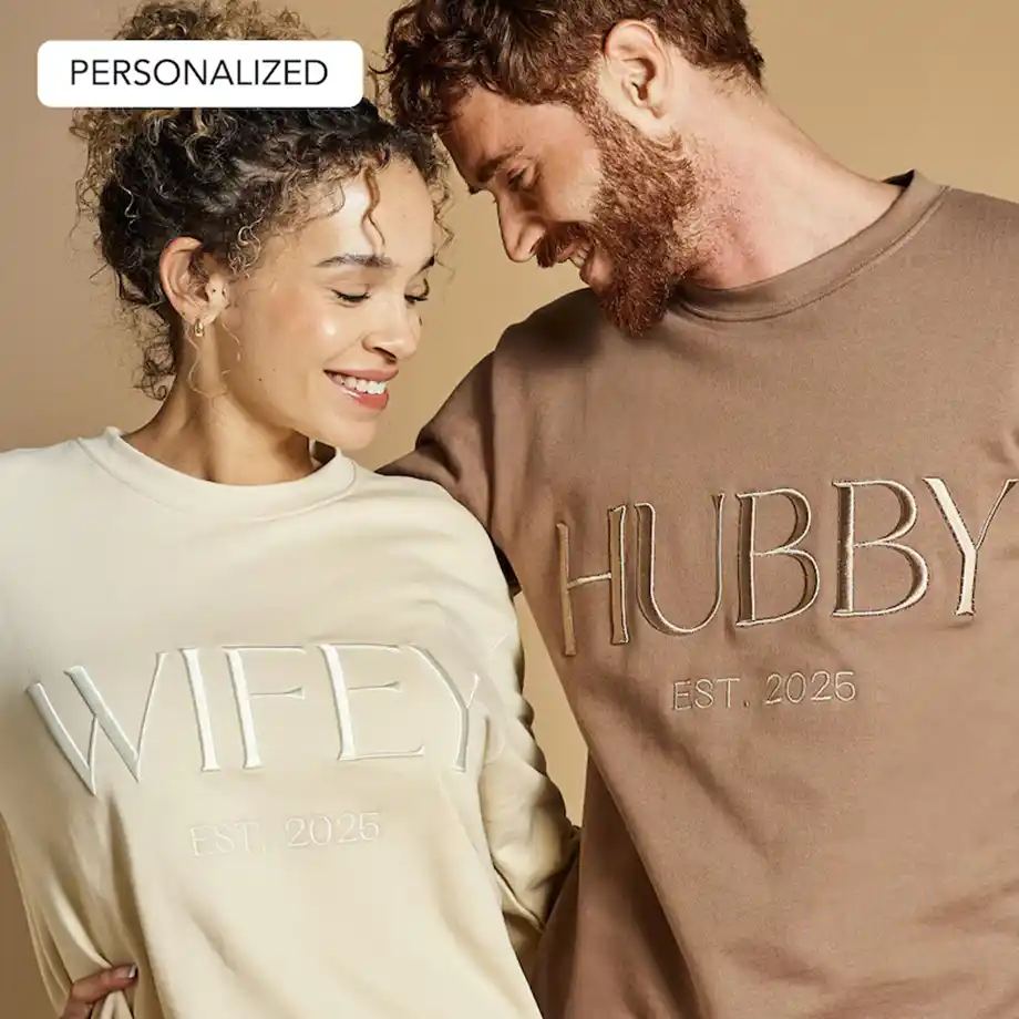 A cozy set of matching husband-and-wife sweatshirts, perfect for celebrating love and sharing birthday wishes for husband. Stylish and comfortable, ideal for couples to wear together.