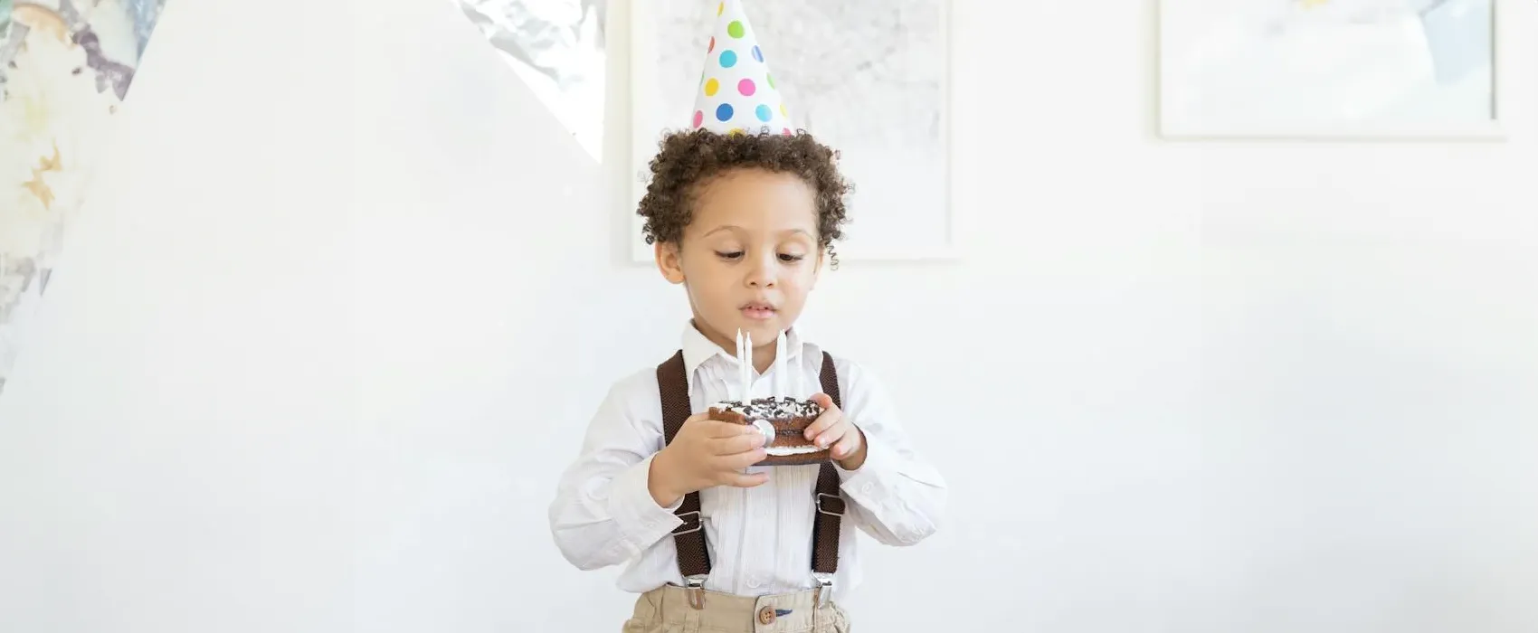 A vibrant image with a colorful cake, lit candles, and festive balloons. Bold text reads 'Happy Birthday, Son!' creating a cheerful and celebratory vibe.