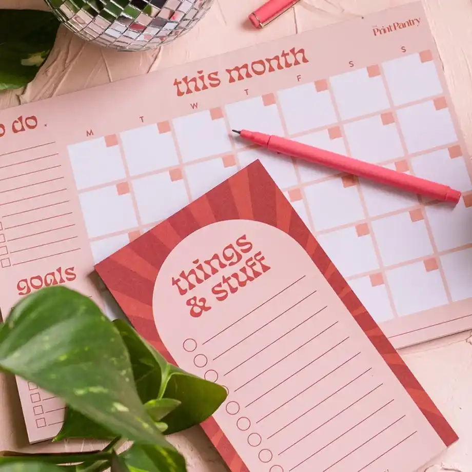 A set of monthly agenda notepads designed for tracking schedules and planning tasks, perfect for organizing bulletproof excuses to get out of work effortlessly.