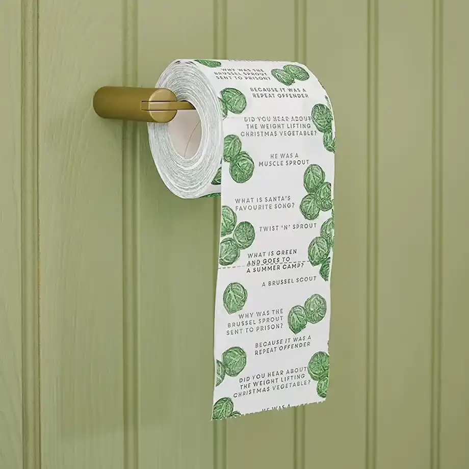 A unique Christmas jokes toilet roll featuring funny holiday-themed puns and gags, perfect as a stocking stuffer or novelty gift for spreading laughter this festive season.