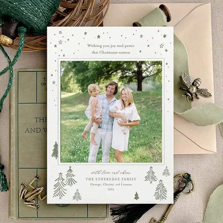 A customizable letterpress holiday photo card featuring a minimalistic design with 1-ink print, perfect for sharing heartfelt Christmas wishes. Includes space for a personal family photo and holiday greeting, blending timeless elegance with modern charm.