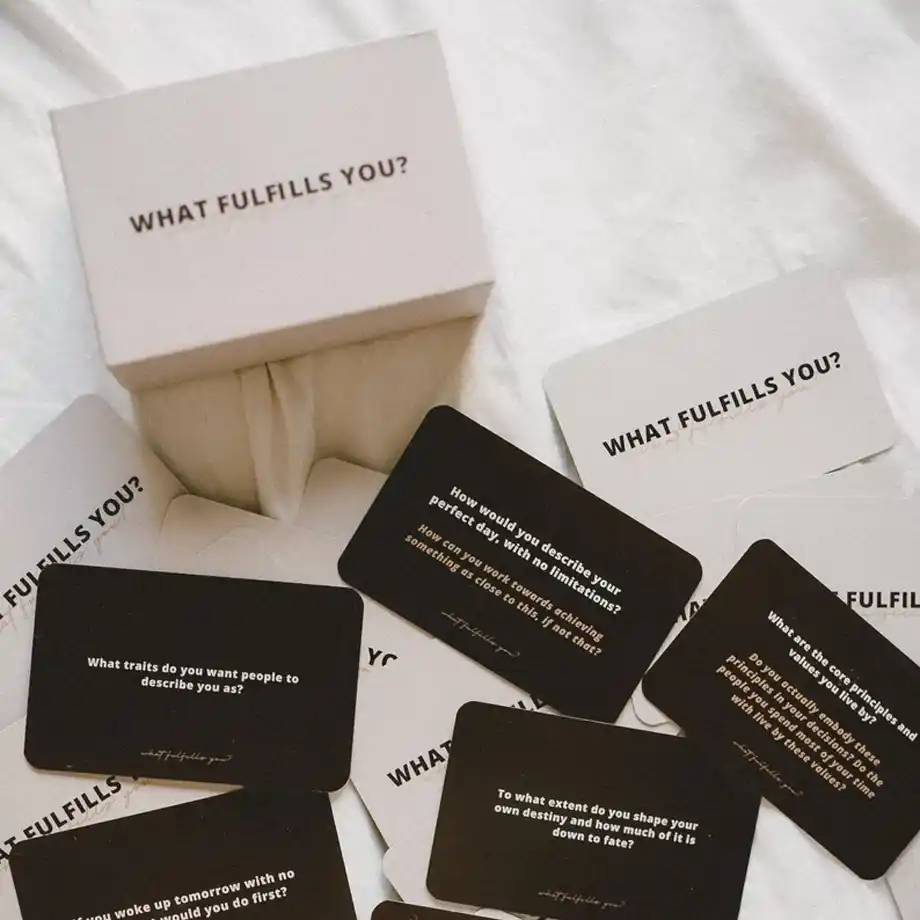 The "What Fulfills You?" card game features a beautifully designed set of meaningful conversation starters. Perfect for fostering deeper connections with friends, family, or partners, this deck encourages thoughtful discussions and personal growth through engaging and insightful prompts.