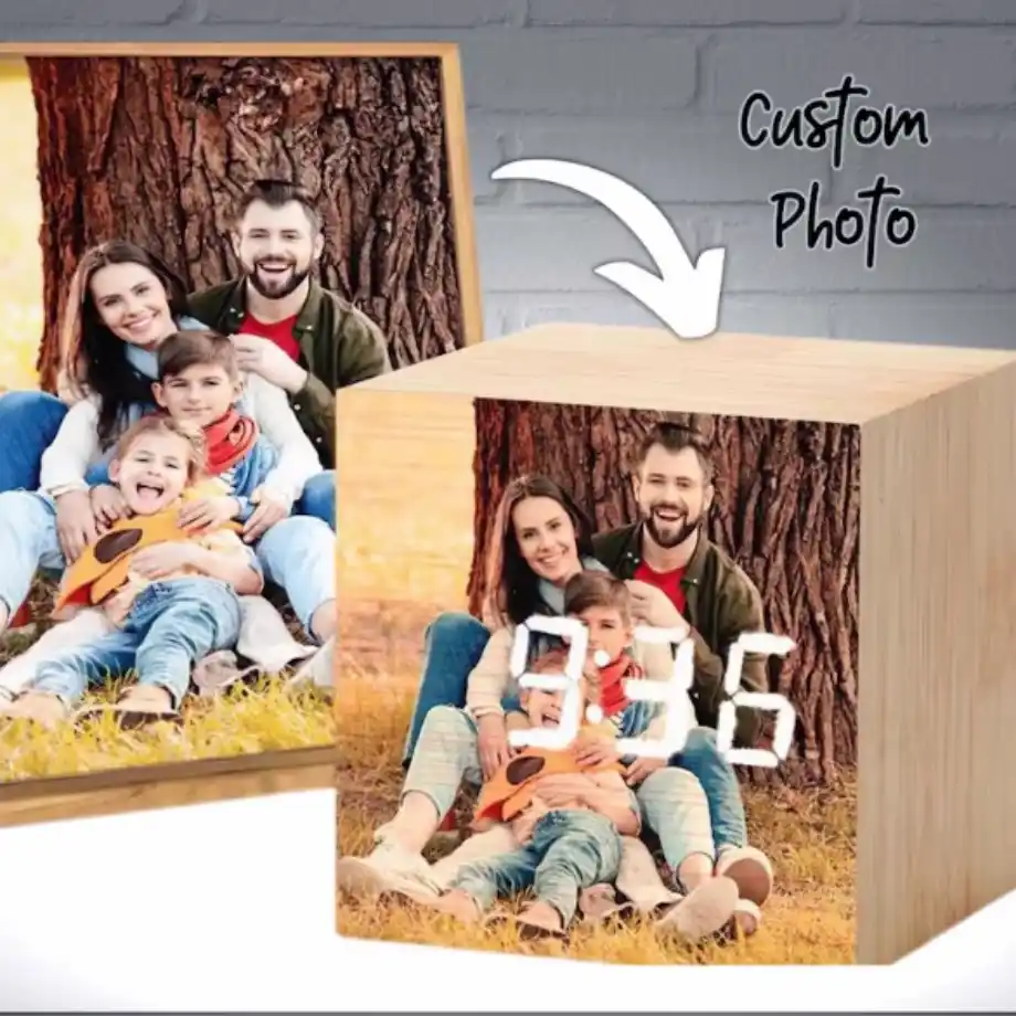 Good morning message for her: A custom wooden digital clock with a family photo of parents and two children sitting under a tree, showing the time 9:36.