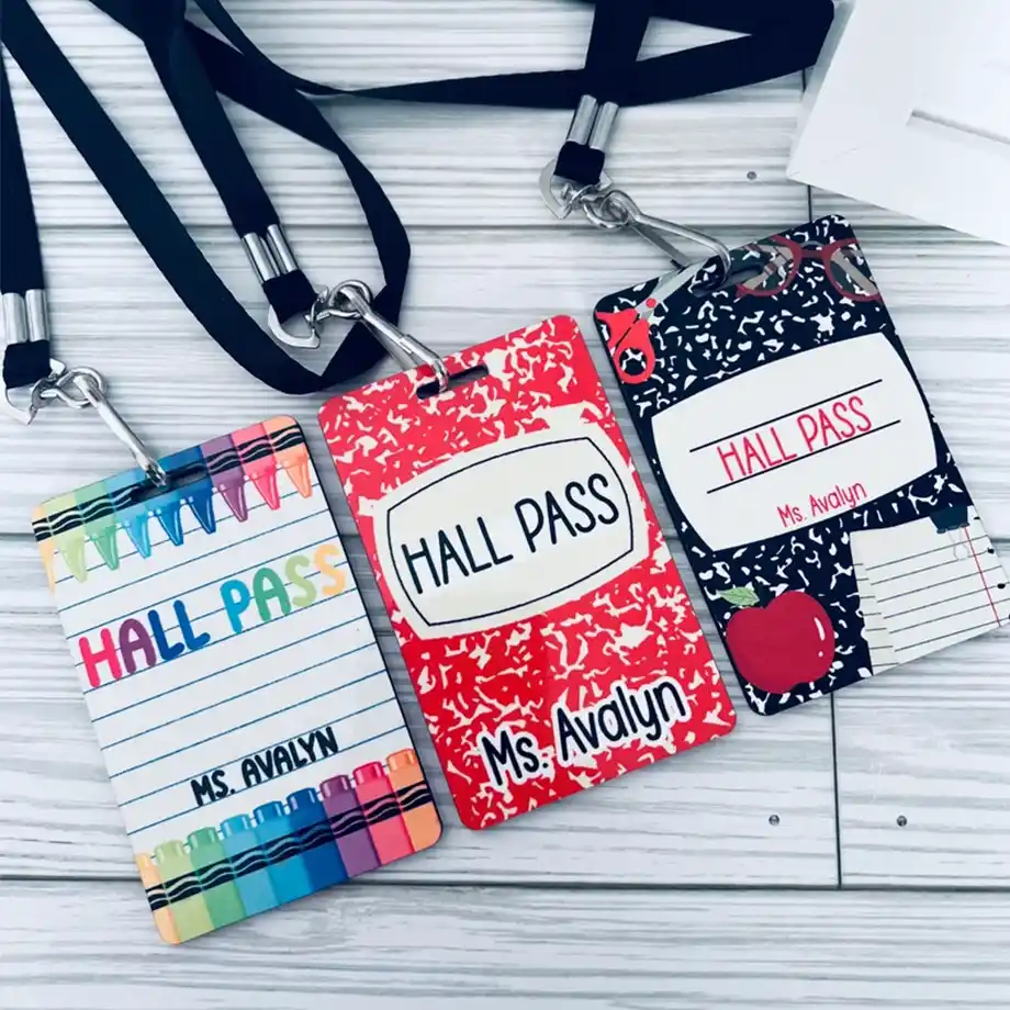 Durable and colorful hall passes, available in various designs, ideal for classrooms. Helps students easily show permission to leave the room.