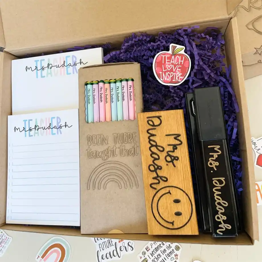 A thoughtfully curated stationery gift basket, featuring notebooks, pens, stickers, and other desk essentials. Perfect for students, teachers, or stationery enthusiasts.