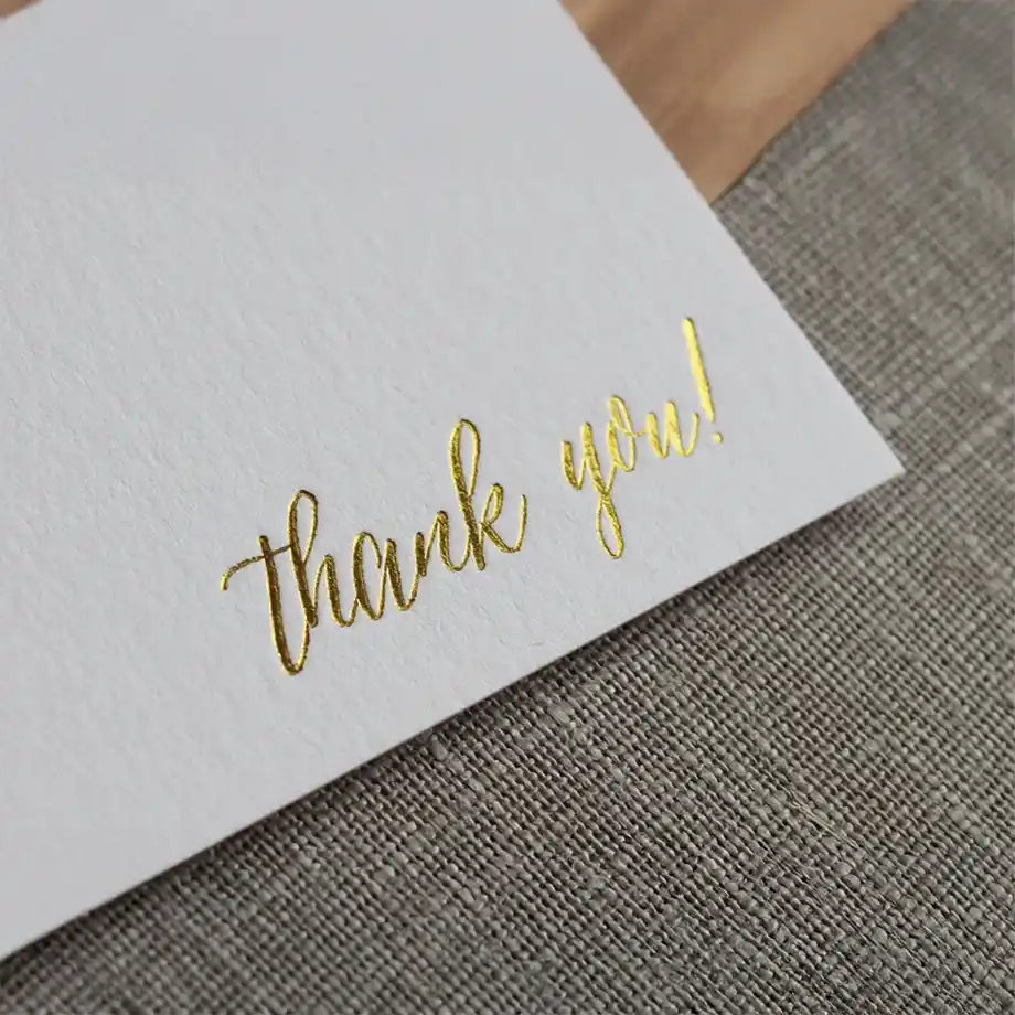 Stunning gold foil letterpress thank you cards featuring an elegant design, ideal for crafting a heartfelt and stylish thank you message for gift-givers. These premium cards showcase sophisticated craftsmanship, perfect for weddings, special occasions, or thoughtful gestures.






