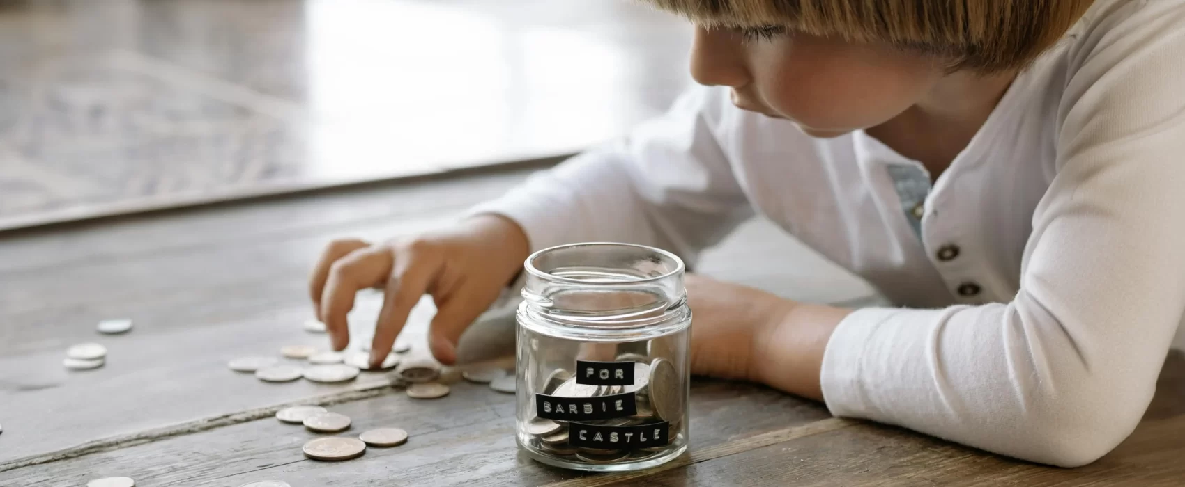 An image of a kid completing tasks like dog walking and babysitting, showing various ways to earn money. It highlights Ways to Make Money as a Kid, promoting entrepreneurial spirit and independence.