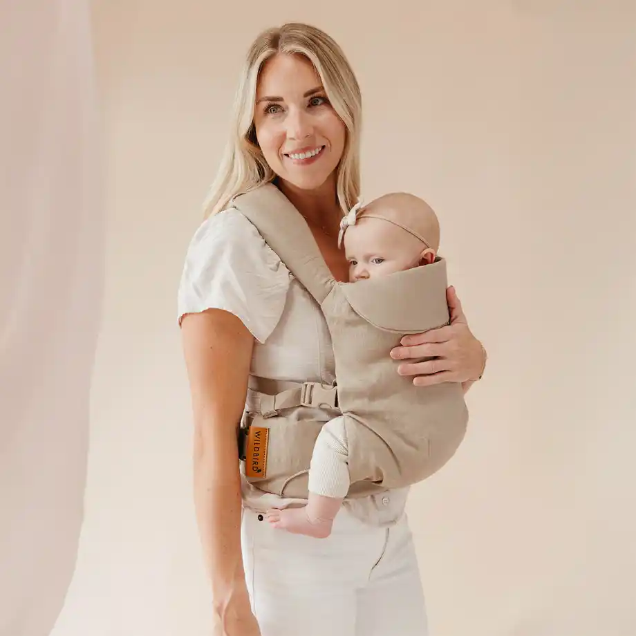 WildBird Aerial Carrier in a chic Desert Lark design, providing hands-free support and close comfort to calm your baby during the witching hour.