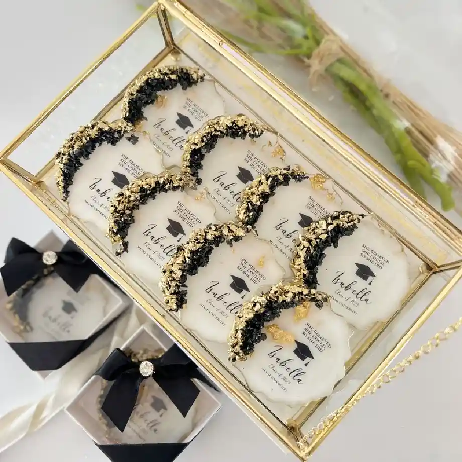 Stylish black and gold personalized graduation magnet favors, perfect for celebrating the Class of 2025 in high school or college.