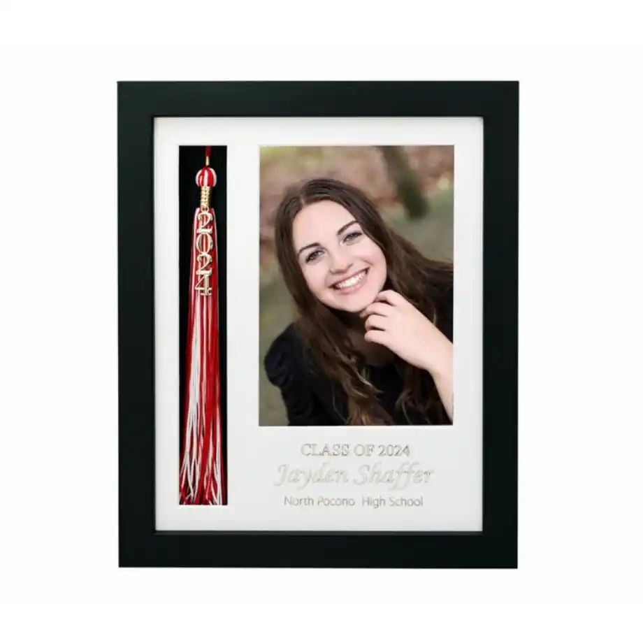 A graduation picture frame with a built-in tassel, perfect for displaying graduation photos and commemorating the special day, making it a meaningful graduation gift idea.