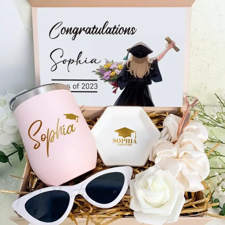 A thoughtfully curated graduation gift basket filled with treats, essentials, and celebratory items, making it a versatile and delightful graduation gift idea.