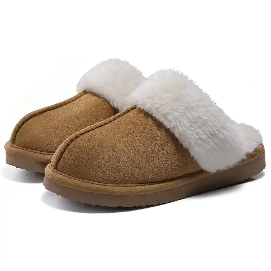 A pair of stylish brown fuzzy slippers with soft white faux fur lining. These warm and comfy slippers make a perfect addition to any white elephant gift ideas list, offering comfort and practicality for the winter season.







