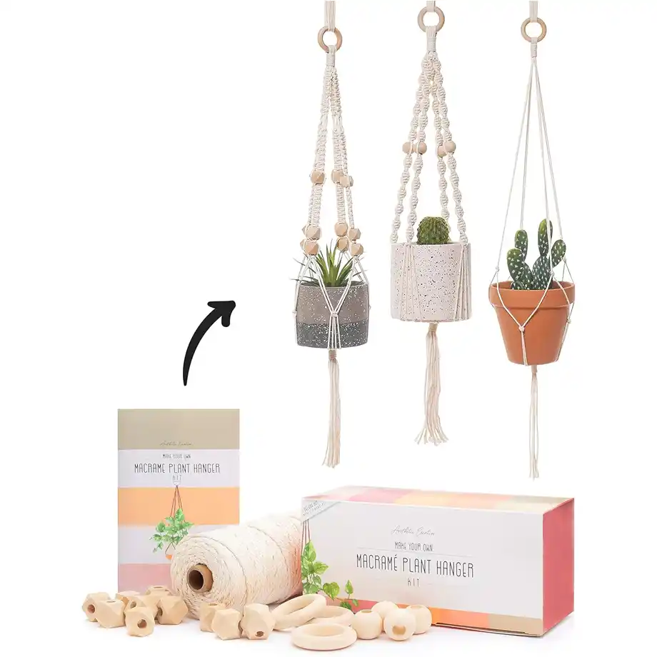 This macrame kit includes everything needed to create three beautiful plant hangers, making it a fun and thoughtful choice for white elephant gift ideas. Perfect for adult beginners with easy-to-follow instructions.