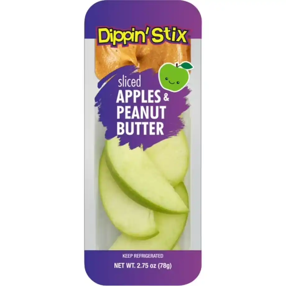 Fresh apple slices with a dollop of creamy peanut butter on a wooden plate – a nutritious and kid-friendly snack.