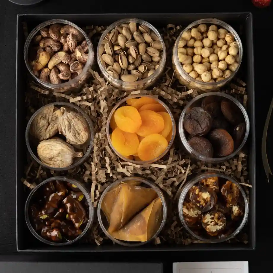 Premium snack gift box with 9 delicious natural snacks, perfect for sharing or enjoying at work. A great gift idea for coworkers who appreciate gourmet treats and thoughtful surprises.