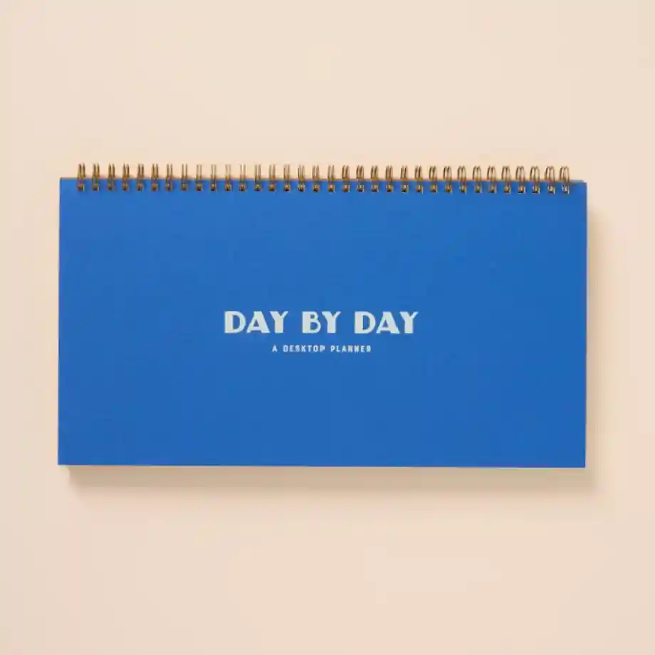 Stylish and functional daily planner designed for organizing tasks, schedules, and goals. A great gift idea for coworkers who love staying productive and on top of their plans.