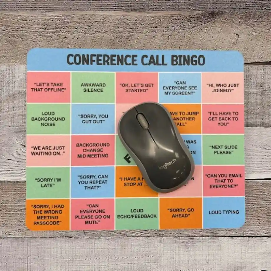 Light-blue Conference Call Bingo Mouse Pad, a funny and functional desk accessory that makes a great gift for coworkers. Perfect for adding humor to long virtual meetings.