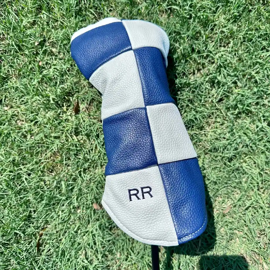 A premium monogrammed driver head cover designed for golf enthusiasts, offering stylish protection for golf clubs while adding a personalized touch to any golfer’s bag.