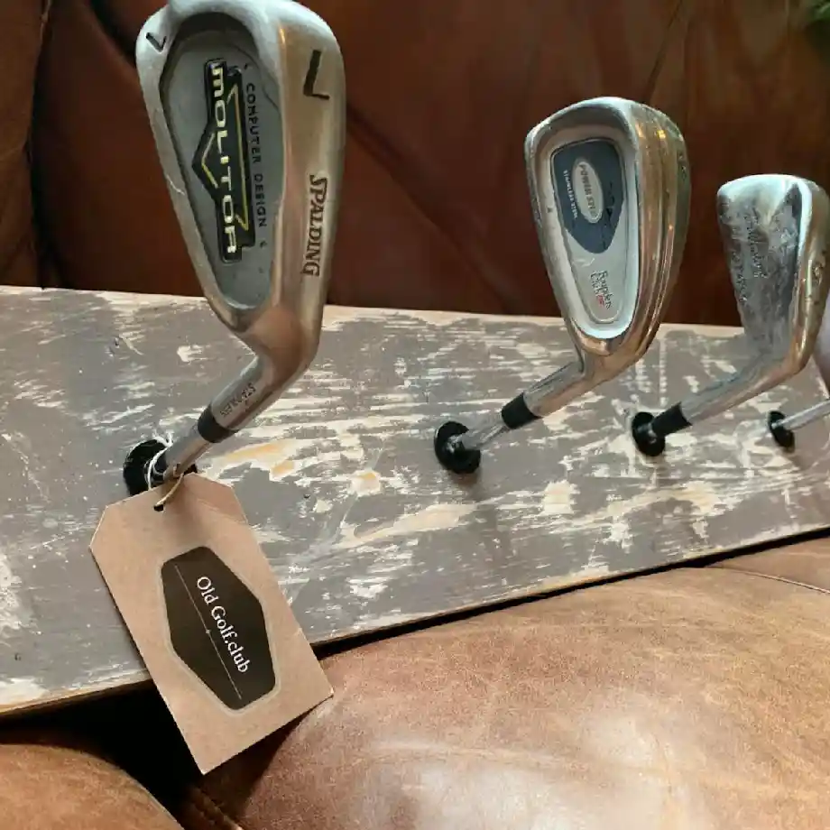 A stylish and functional golf iron hat rack made from upcycled golf clubs, perfect for organizing hats, caps, or accessories. A great golf gift for him on Father's Day, birthdays, or graduations. Ideal for home, office, or man cave décor with fast shipping available.