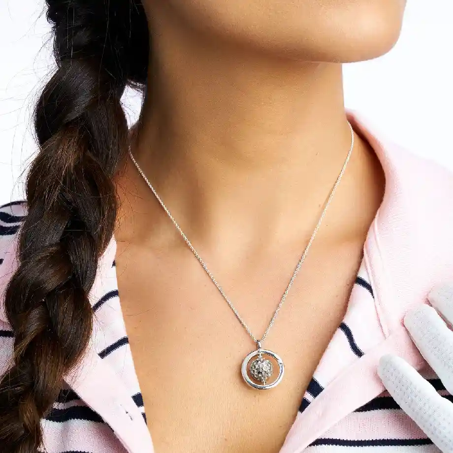 Elegant Hole in One necklace featuring a spinning golf ball design. A stylish and meaningful accessory for golf lovers, this necklace is a perfect keepsake or gift for golfers who want to celebrate their love for the game. Ideal for everyday wear or special golf events.