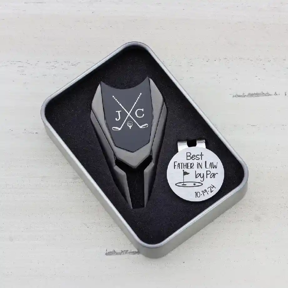 A custom-engraved golf ball marker divot tool, perfect as a Father of the Groom gift from the bride. A meaningful keepsake for golf-loving fathers and in-laws.