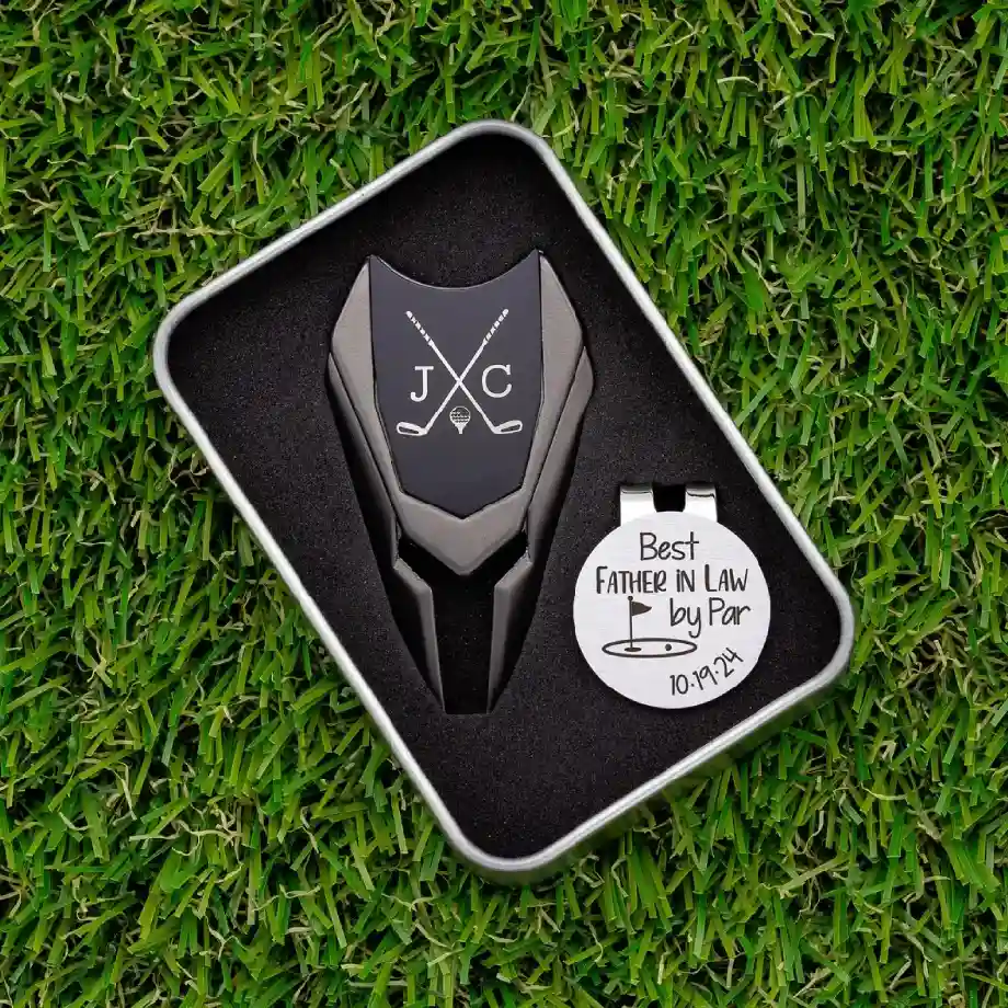 A custom golf ball marker divot tool, a perfect keepsake for the father of the groom—great for wedding-inspired golf gift ideas.