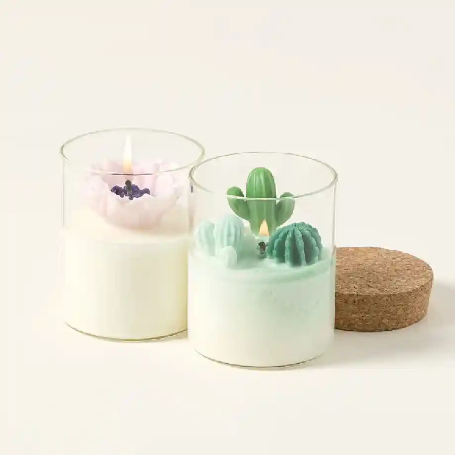 Hand-poured terrarium candle featuring intricate cactus and poppy designs with a delightful fragrance. A unique and stylish gift idea for coworkers who love decorative and aromatic candles