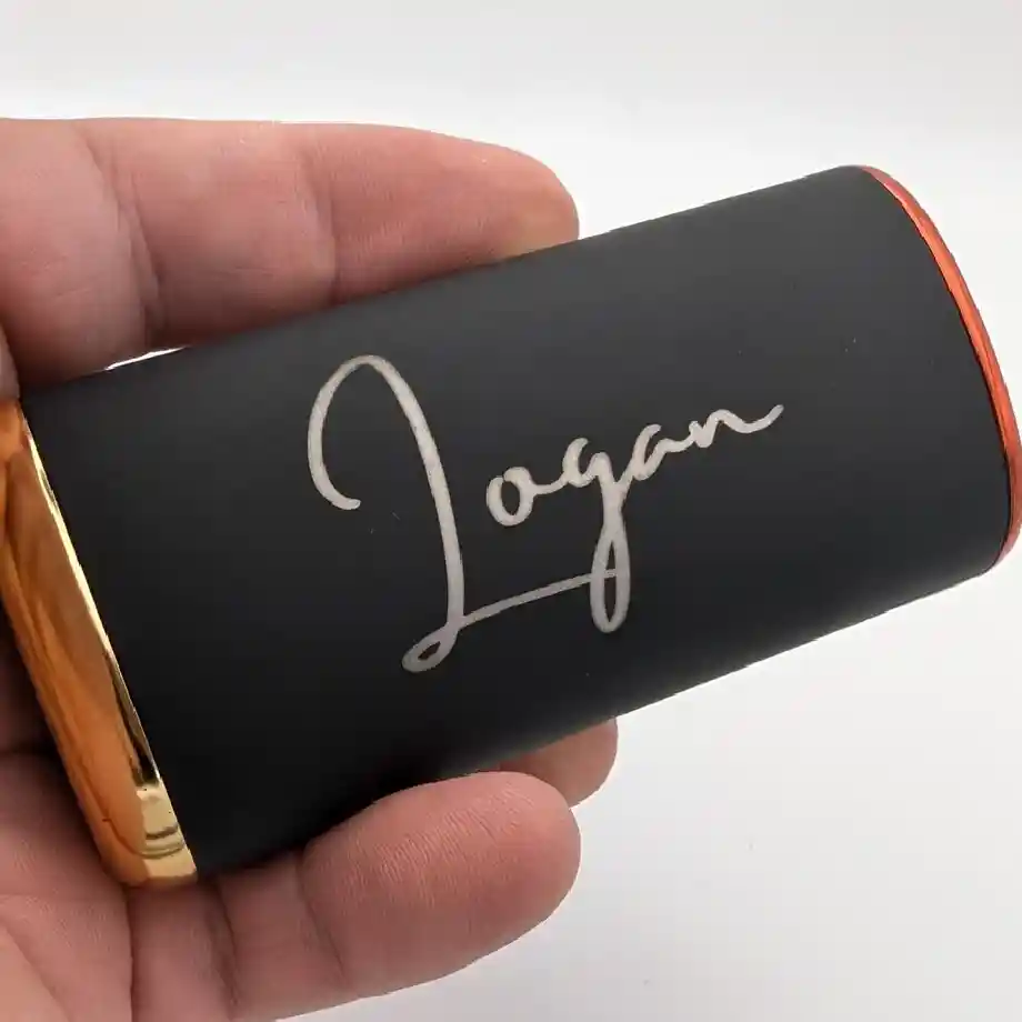 Customizable 10,000mAh hand warmer that doubles as a backup battery, perfect for keeping hands warm and devices charged. A unique and useful gift idea for coworkers during cold weather.