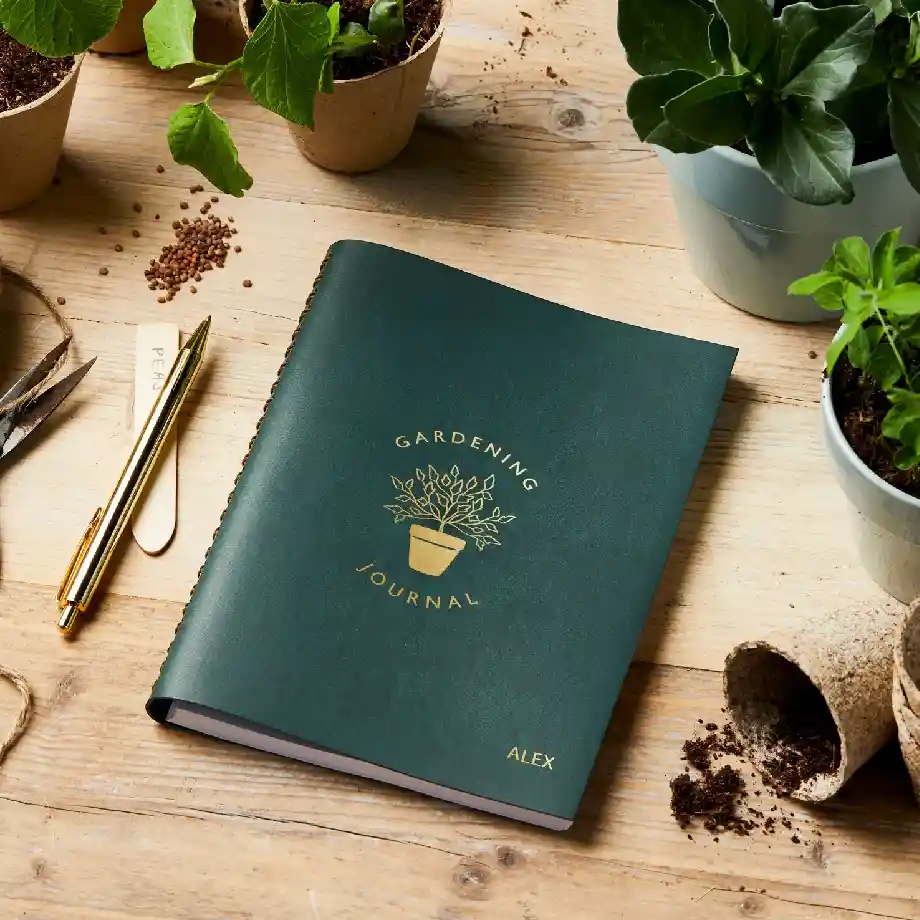 Stylish gardening planner with a leather-effect cover, perfect for organizing gardening notes and plans. A great gift idea for coworkers who enjoy gardening and staying organized.