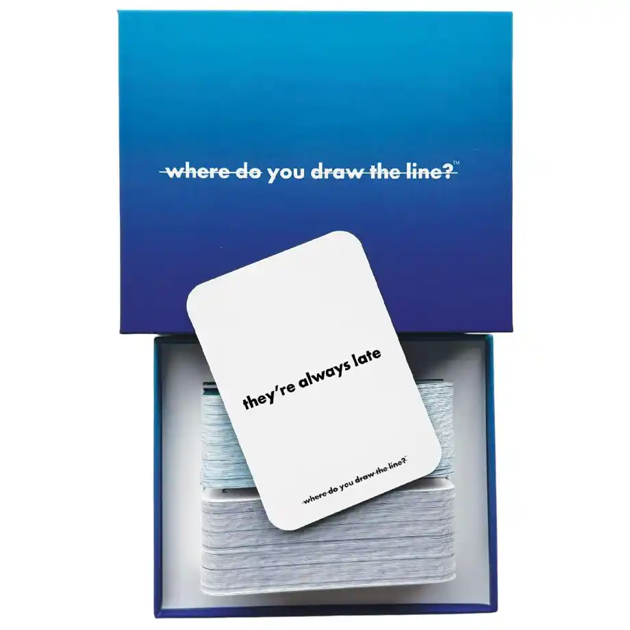 An open box of the Where Do You Draw the Line card game featuring a white card with the phrase They are always late The game encourages discussions about red flags in relationships and personal boundaries with a blue gradient box displaying the game's title